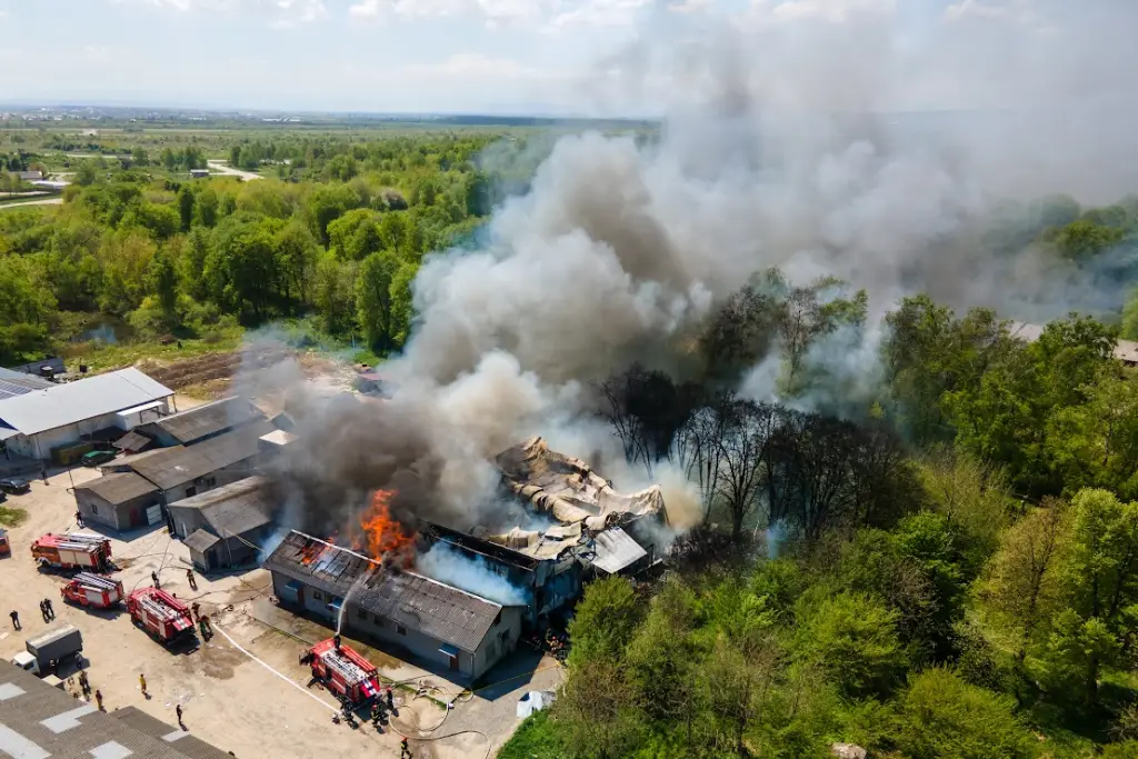 Aerial view of a house on fire.